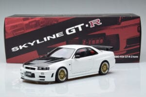 Nissan Skyline GT-R R34 Nismo Z-Tune Bianco MotorHelix 1:18 M83407 Pressofusione — immagine 11 di 11