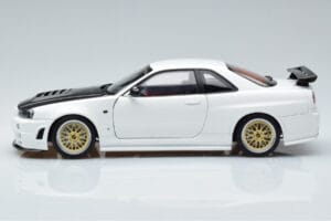 Nissan Skyline GT-R R34 Nismo Z-Tune Bianco MotorHelix 1:18 M83407 Pressofusione — immagine 5 di 11