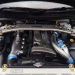 Nissan Skyline GT-R R34 Nismo Z-Tune Bianco MotorHelix 1:18 - image 9 of 11