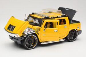Hummer H2 SUT Concept Giallo Maisto 1:18 31067 Pressofusione — immagine 2 di 8