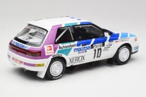 Mazda 323 GTX #10 T. Makinen / S. Harjanne 1000 Lakes Rally 1991 Otto 1:18 OT1099 Resina — immagine 2 di 6