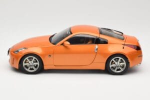 Nissan 350Z Z33 Sunset Orange AUTOart 1:18 77312 Pressofusione — immagine 4 di 8