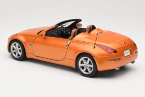 Nissan Fairlady Z Z33 Roadster Sunset Orange AUTOart 1:18 77377 Pressofusione — immagine 7 di 8