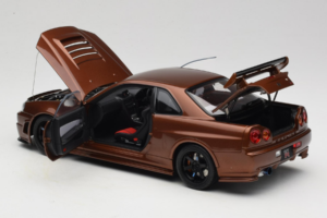 Nissan Skyline GT-R R34 Customized Metallic Bronze MotorHelix 1:18 M83414 Pressofusione — immagine 5 di 8