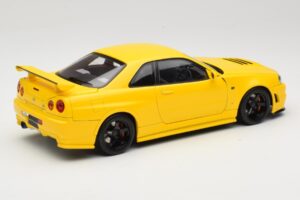 Nissan Skyline GT-R R34 Customized Version Giallo MotorHelix 1:18 M83412 Pressofusione — immagine 3 di 8