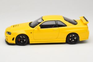 Nissan Skyline GT-R R34 Customized Version Giallo MotorHelix 1:18 M83412 Pressofusione — immagine 4 di 8