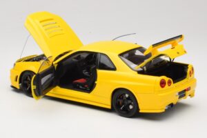 Nissan Skyline GT-R R34 Customized Version Giallo MotorHelix 1:18 M83412 Pressofusione — immagine 5 di 8