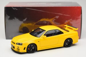 Nissan Skyline GT-R R34 Customized Version Giallo MotorHelix 1:18 M83412 Pressofusione — immagine 8 di 8