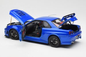 Nissan Skyline GT-R R34 NISMO Z-Tune Bayside Blu AUTOart 1:18 77354 Composito — immagine 5 di 8