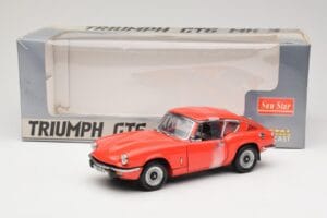 Triumph GT6 Mk3 Rosso Sun Star 1:18 1056 Pressofusione — immagine 6 di 6