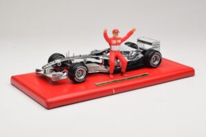 Ferrari F2004 #1 M. Schumacher Six Time World Champion 2004 Cromo Argento Hot Wheels 1:18 C7332 Pressofusione
